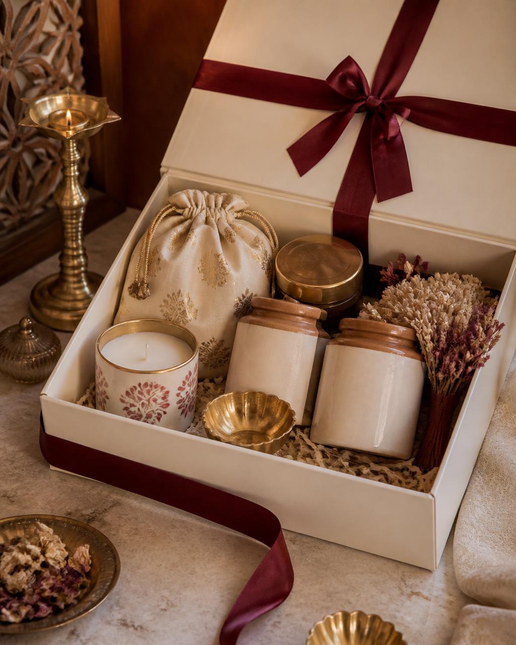 A completed La Occasio hamper tied with burgundy ribbon